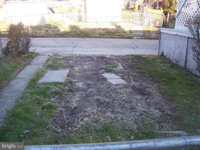 1310 Kitmore Road Baltimore, MD 21239 - Photo 13 of 18 Exterior (Rear)-driveway