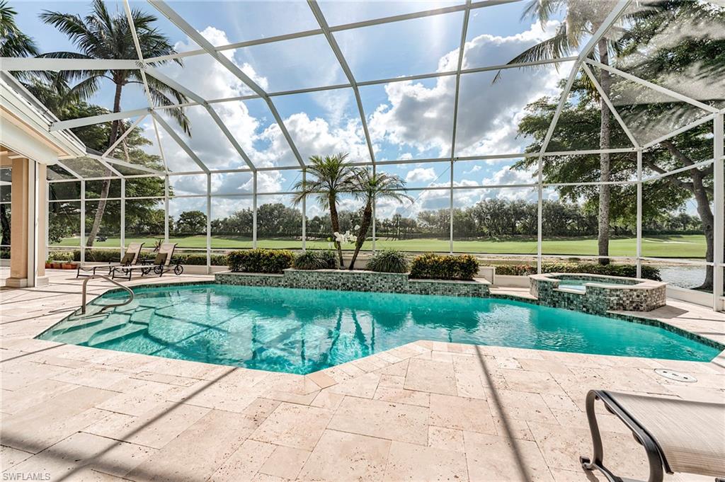 10200 Orchid Ridge Lane Estero, FL 34135 - Photo 2 of 50 a view of a backyard with a garden and plants