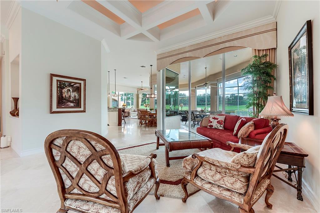 10200 Orchid Ridge Lane Estero, FL 34135 - Photo 6 of 50 a living room with furniture and a large window