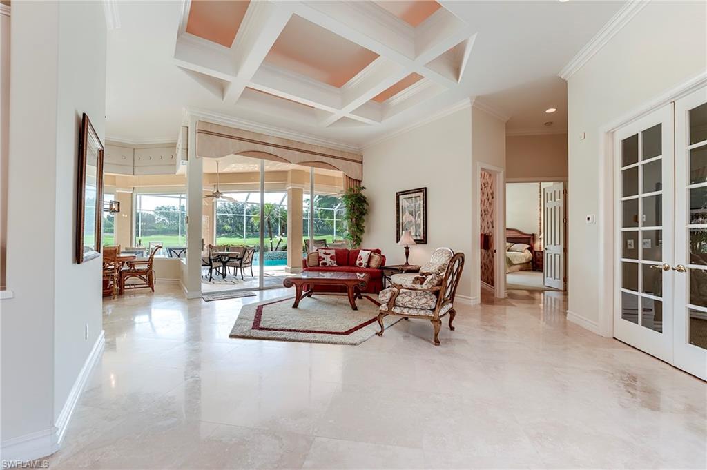 10200 Orchid Ridge Lane Estero, FL 34135 - Photo 7 of 50 a living room with furniture and a large window