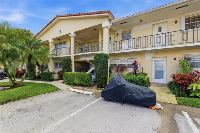 a house view with a garden space