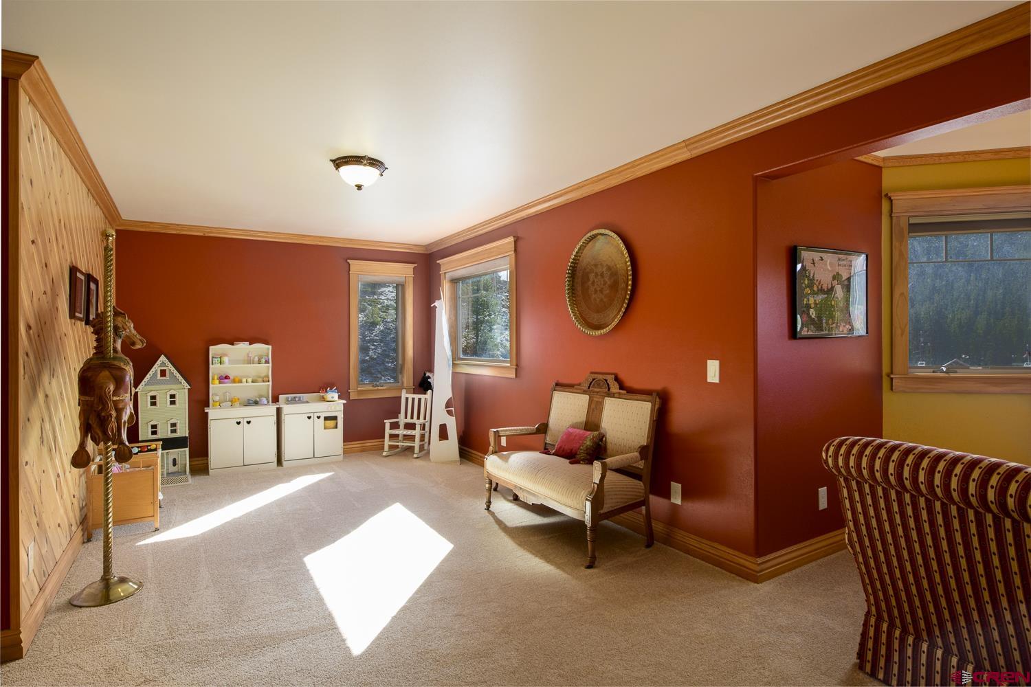 825-823 Main Street Pitkin, CO 81241 - Photo 21 of 42 a living room with furniture a rug and a large window