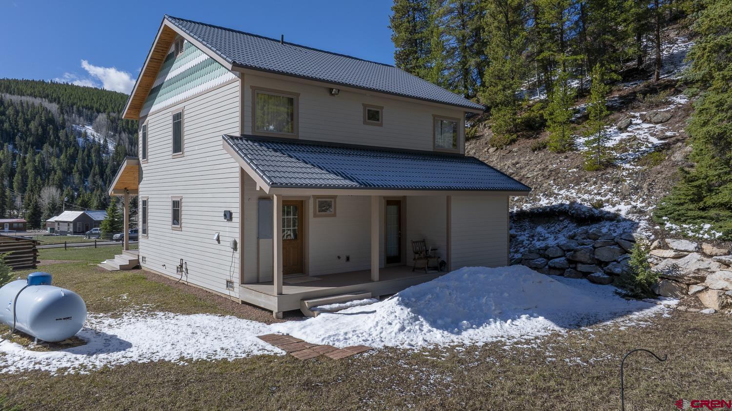 825-823 Main Street Pitkin, CO 81241 - Photo 30 of 42 a view of a house with a yard