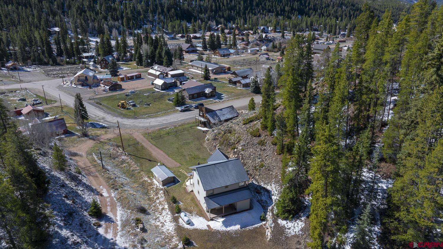 825-823 Main Street Pitkin, CO 81241 - Photo 32 of 42 a view of a house with a garden