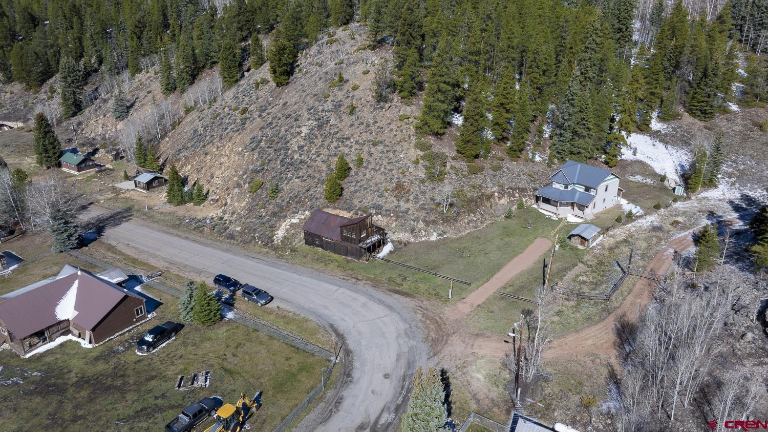 825-823 Main Street Pitkin, CO 81241 - Photo 33 of 42 an aerial view of a house with a yard