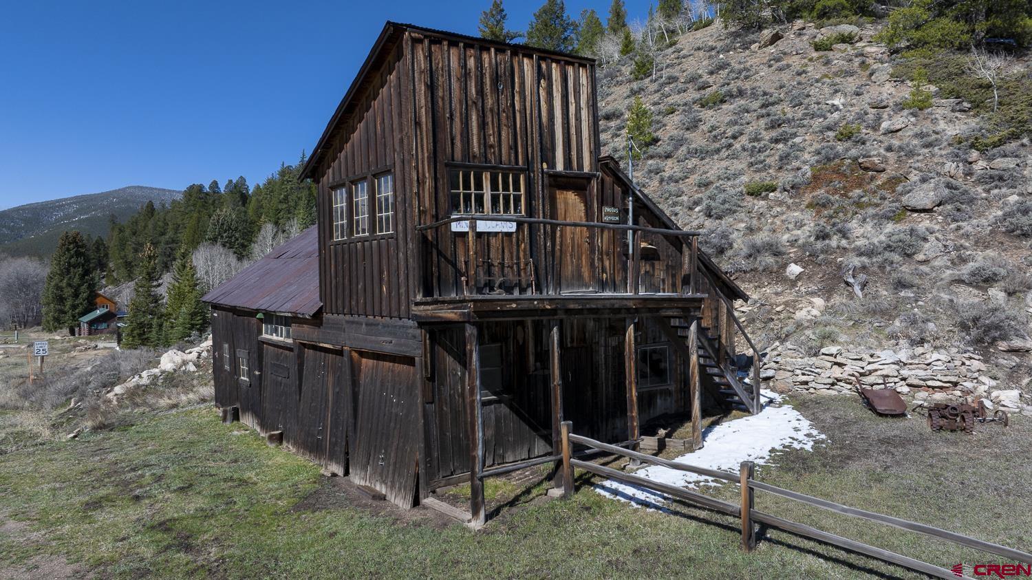 825-823 Main Street Pitkin, CO 81241 - Photo 41 of 42 a view of a house with wooden fence