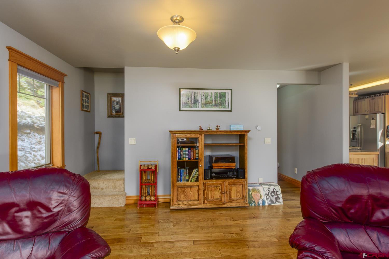 825-823 Main Street Pitkin, CO 81241 - Photo 7 of 42 a living room with furniture and a window