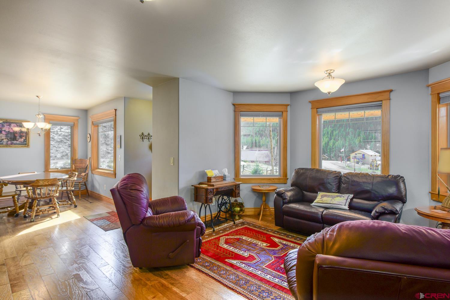 825-823 Main Street Pitkin, CO 81241 - Photo 8 of 42 a living room with furniture and a large window