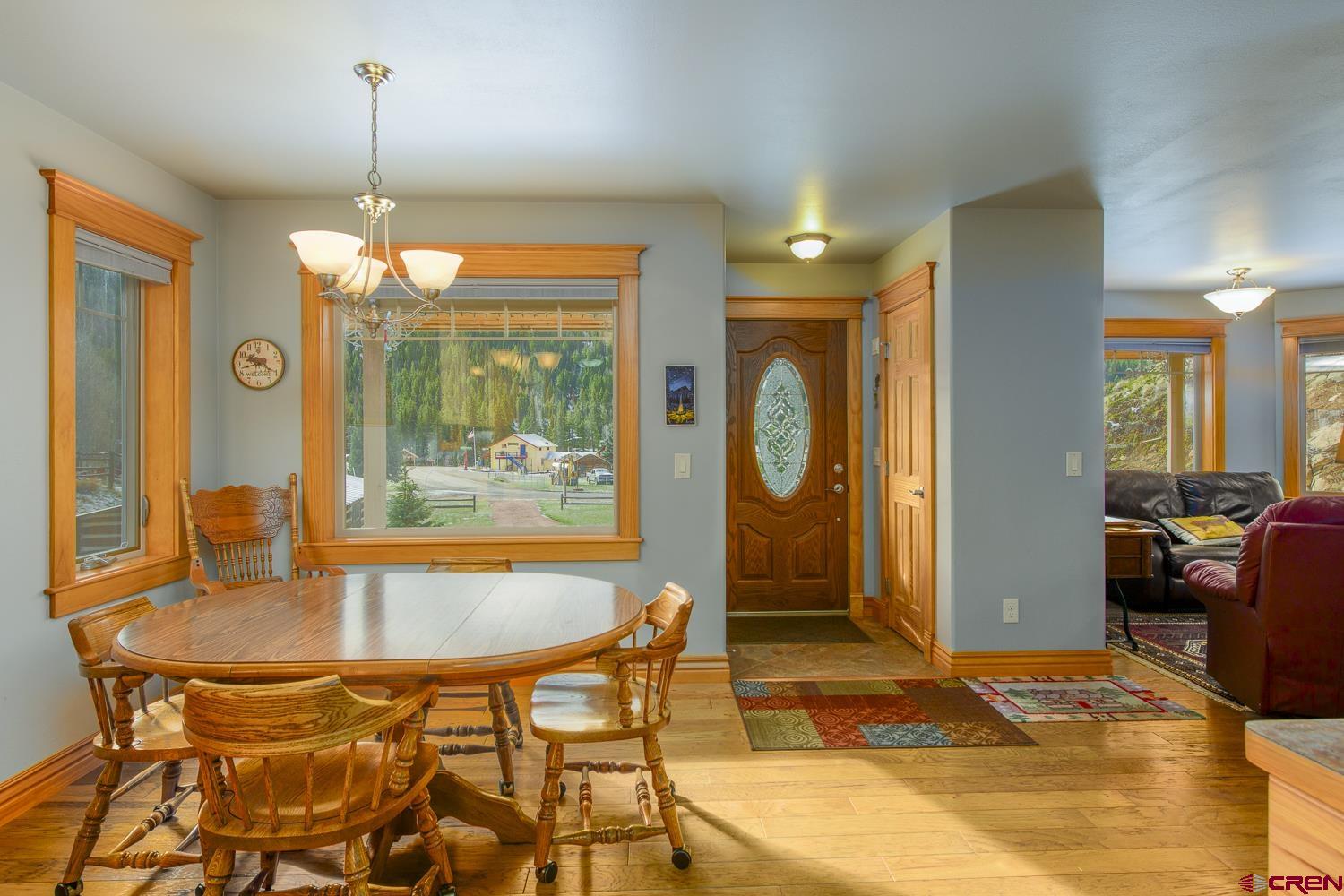 825-823 Main Street Pitkin, CO 81241 - Photo 9 of 42 a dining room with a table and chairs