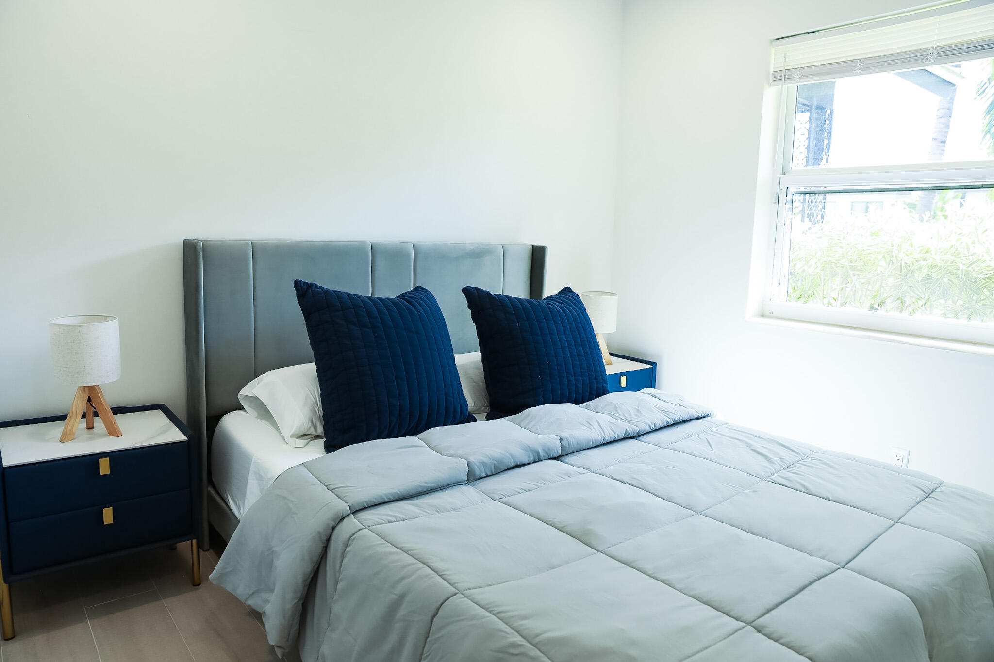 1502 Northwest 4th Avenue Delray Beach, FL 33444 - Photo 20 of 28 a bedroom with a bed and a window