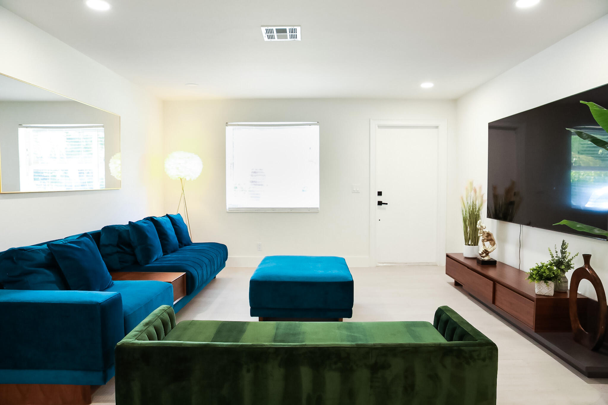 1502 Northwest 4th Avenue Delray Beach, FL 33444 - Photo 6 of 28 a living room with furniture and a flat screen tv