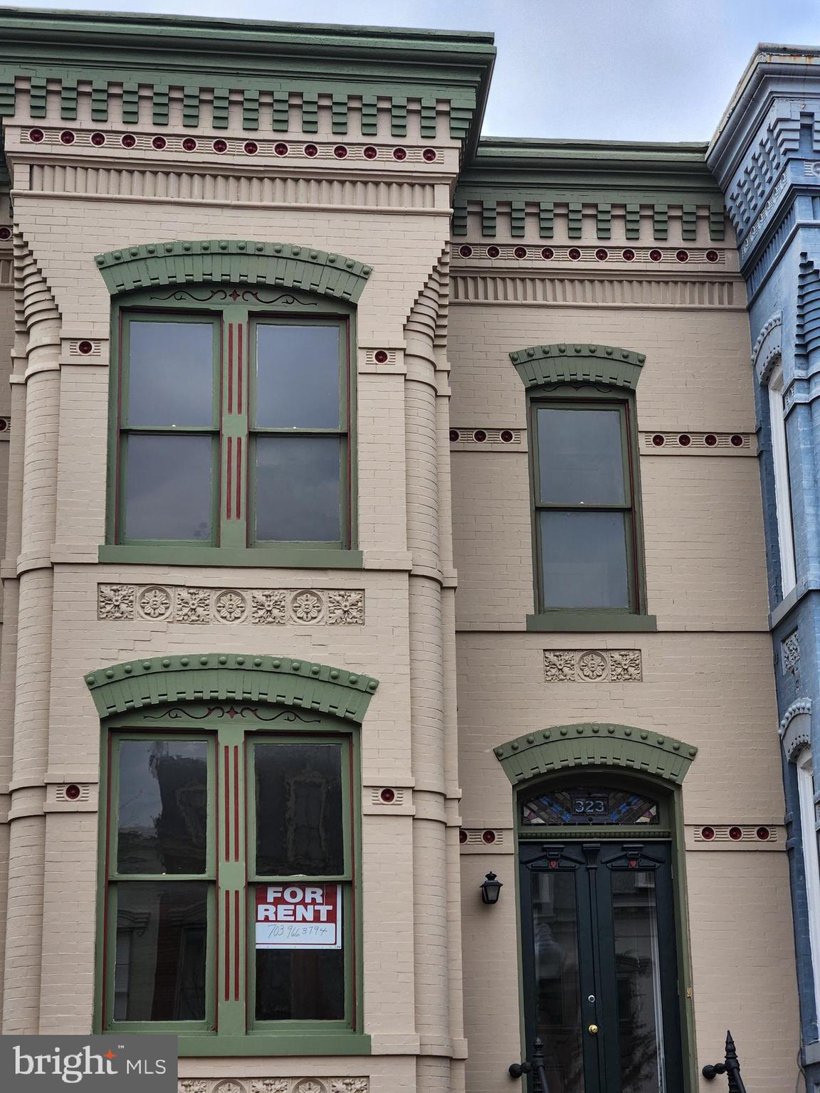 323 2nd Street Southeast Washington, DC 20003 - Photo 1 of 16 a stove top oven sitting inside of a kitchen