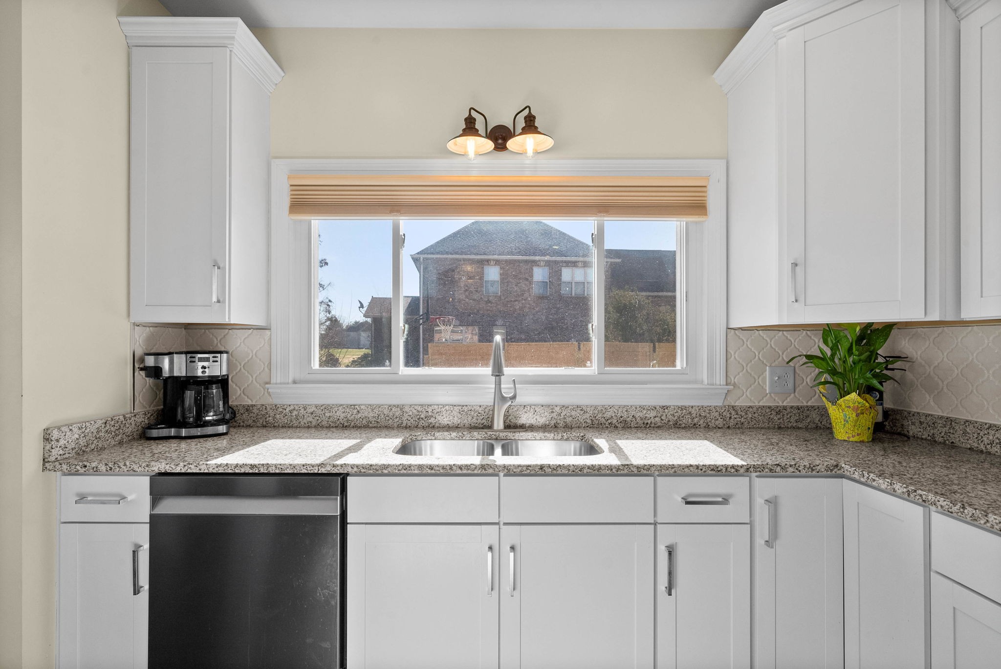 4787 Sango Road Clarksville, TN 37043 - Photo 21 of 55 a kitchen with a sink and a window
