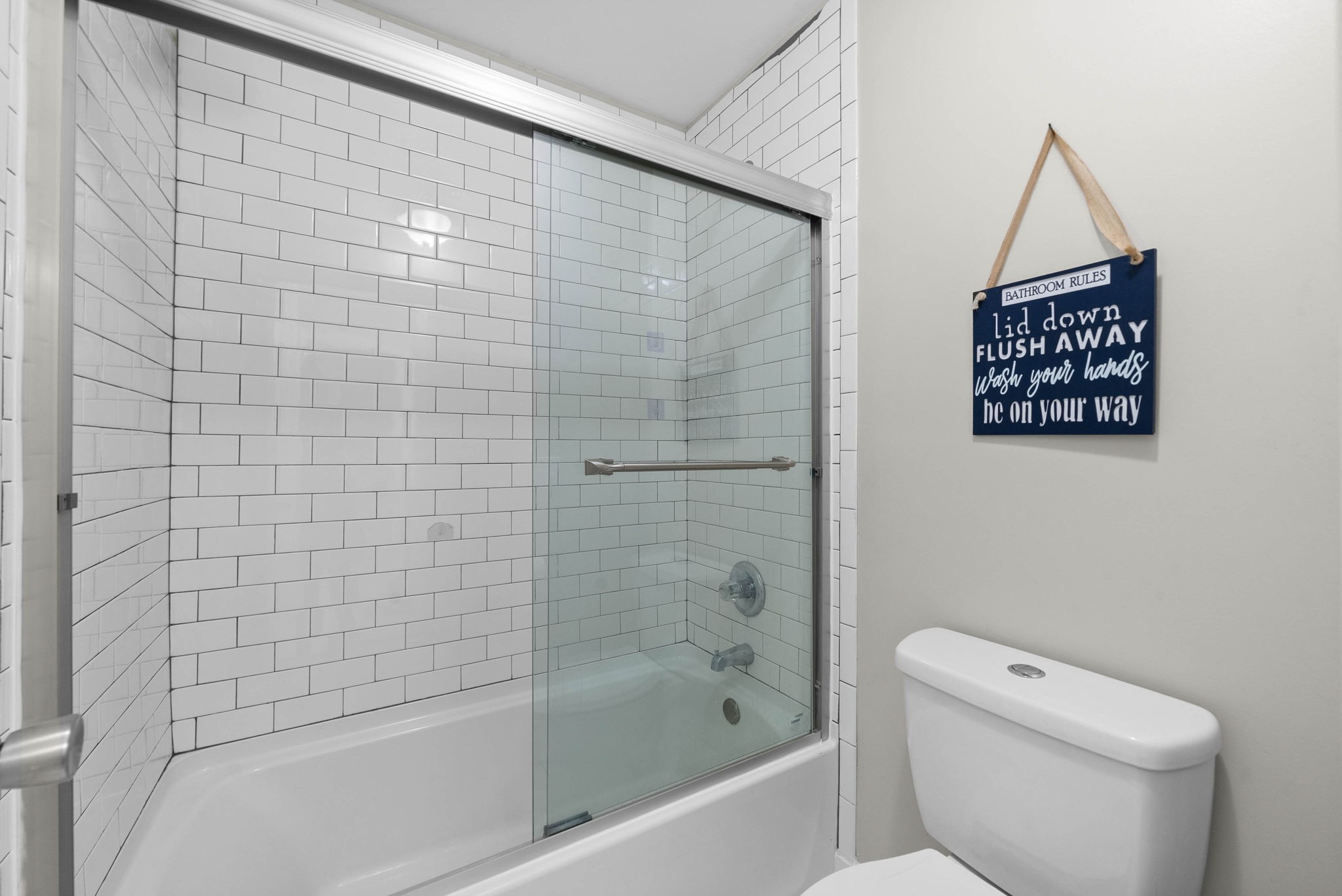 4787 Sango Road Clarksville, TN 37043 - Photo 43 of 55 a bathroom with a toilet and a bathtub