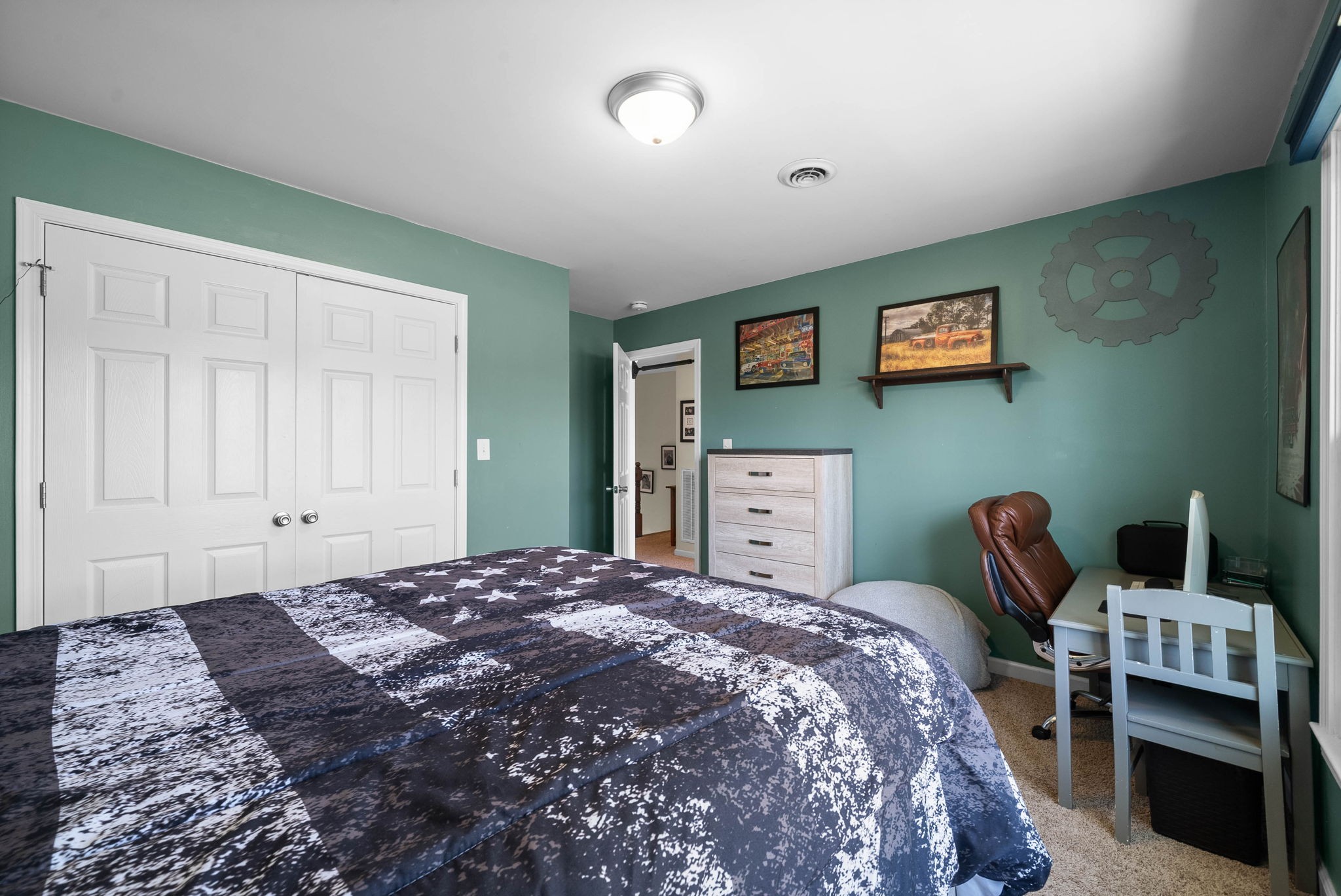 4787 Sango Road Clarksville, TN 37043 - Photo 45 of 55 a bedroom with a bed and a table in it