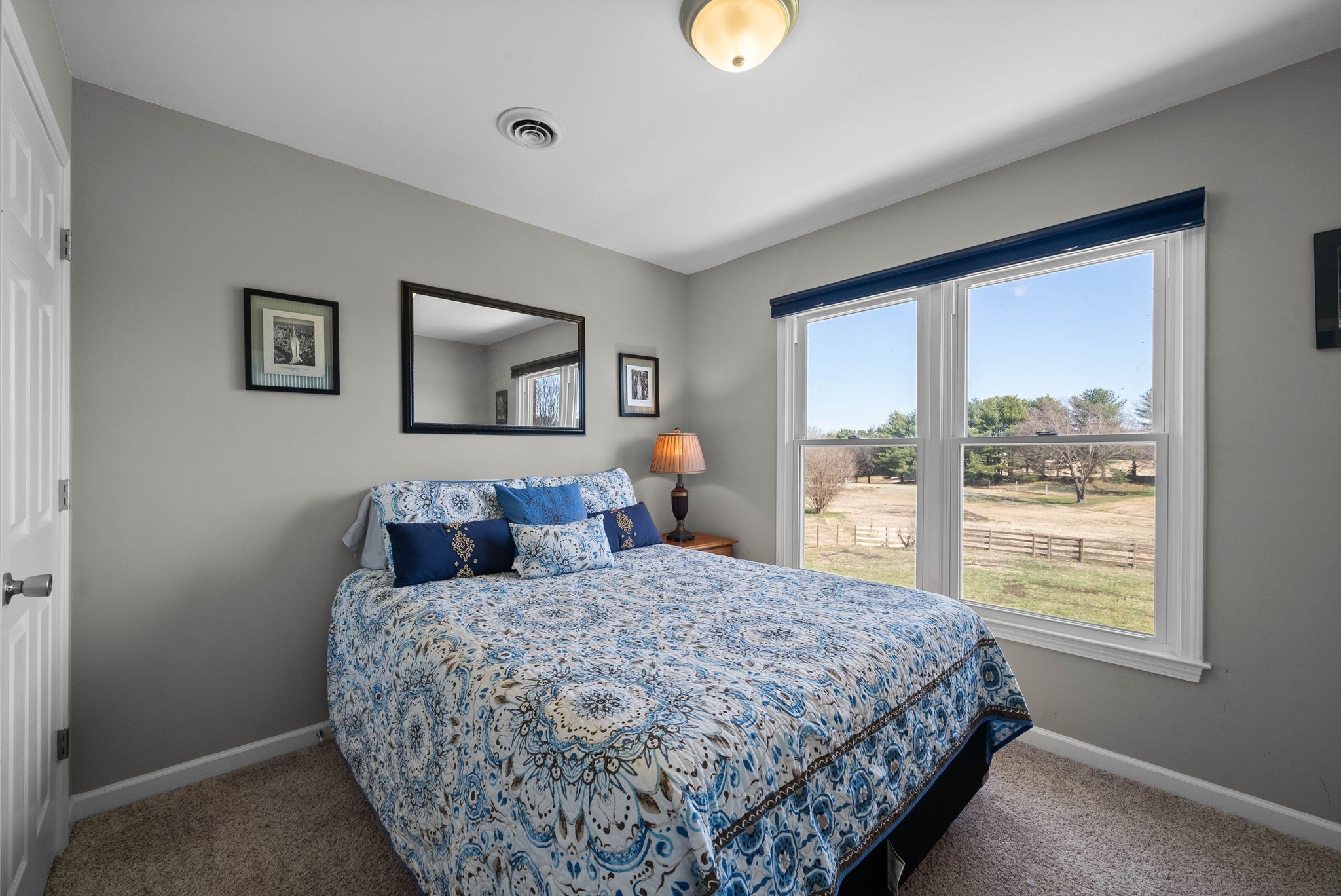 4787 Sango Road Clarksville, TN 37043 - Photo 46 of 55 a bedroom with a large bed and a window