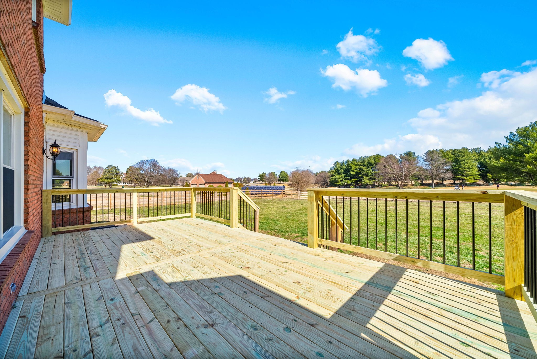 4787 Sango Road Clarksville, TN 37043 - Photo 49 of 55 a view of a balcony with wooden floor and fence