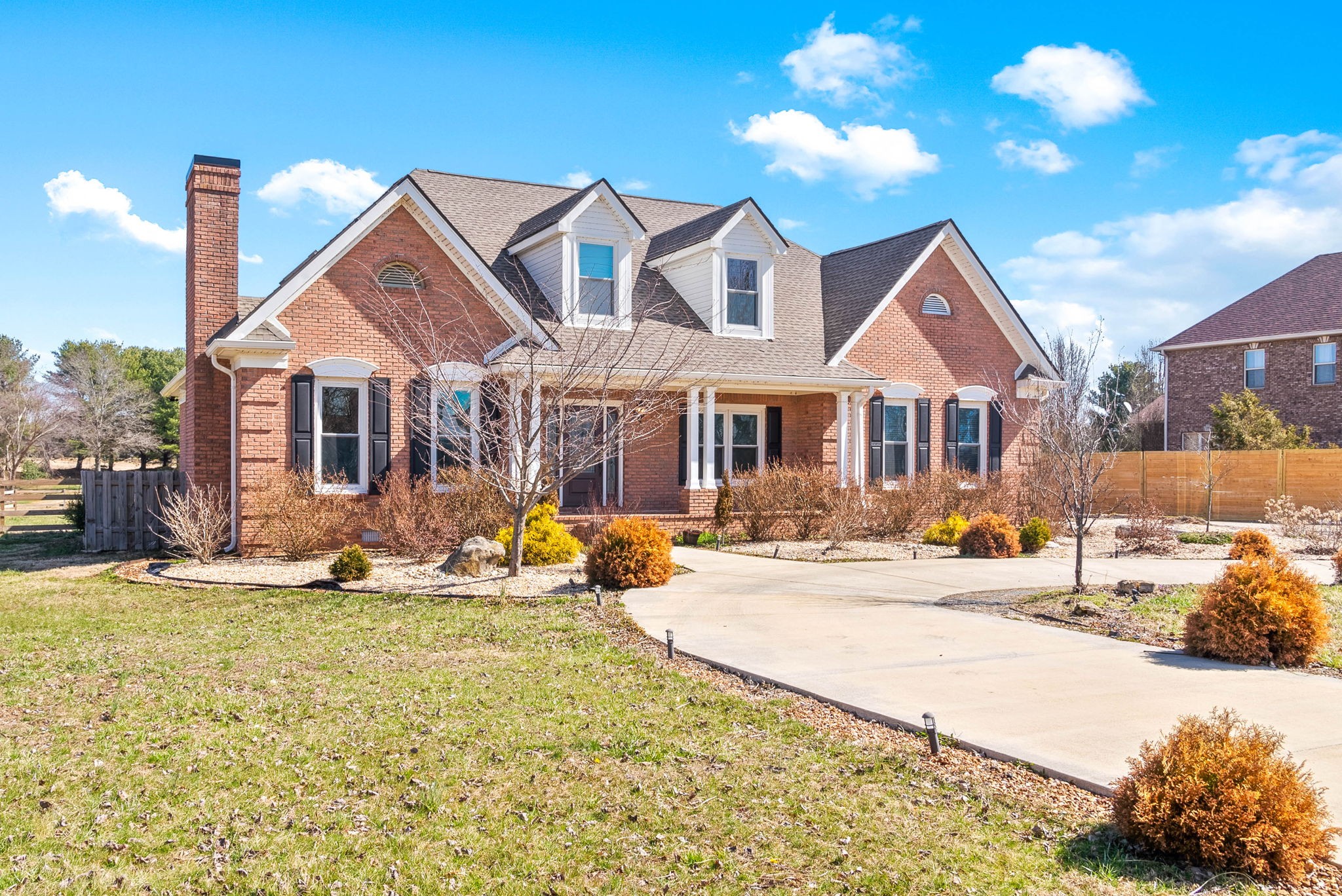 4787 Sango Road Clarksville, TN 37043 - Photo 5 of 55 a front view of a house with yard patio and fire pit