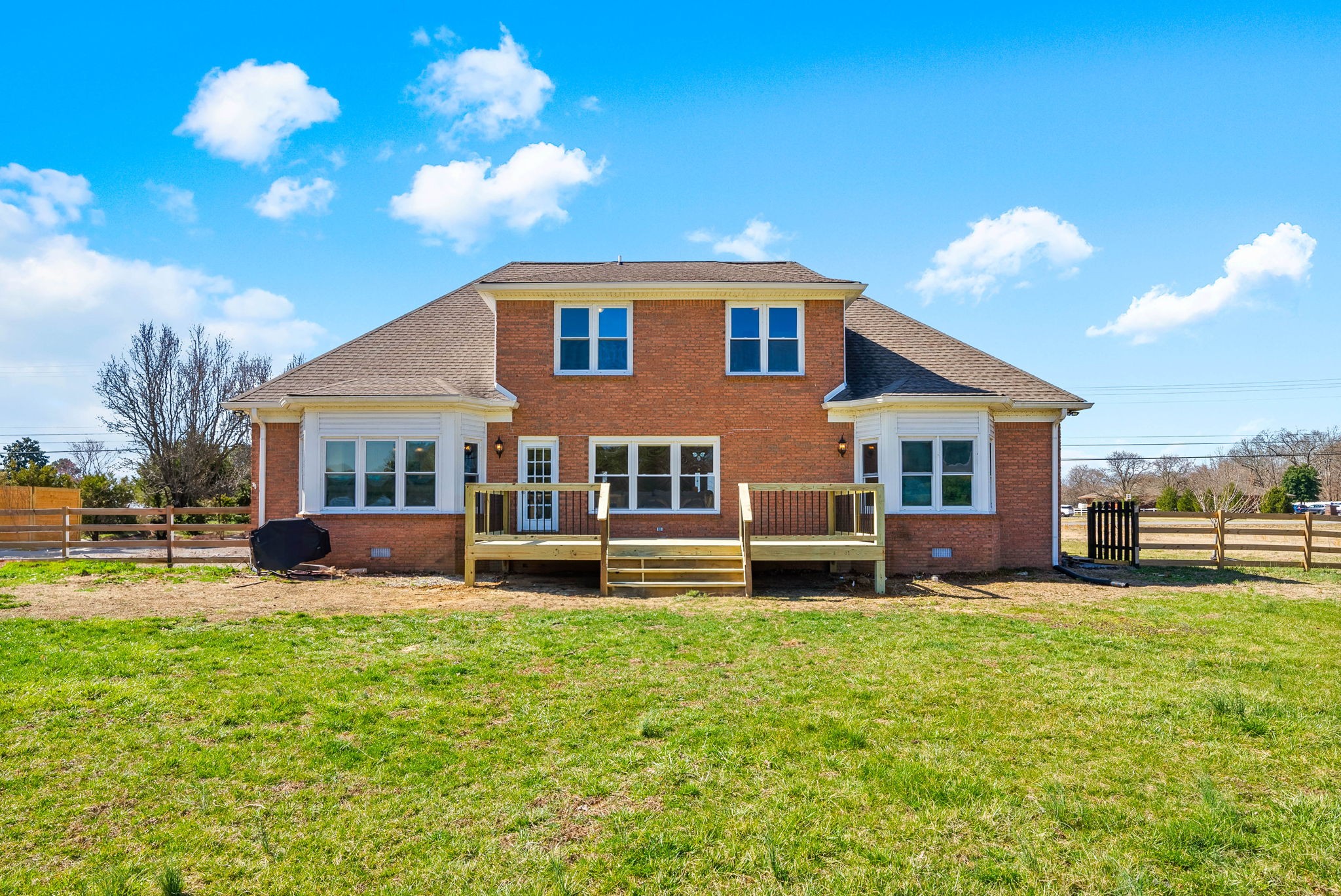 4787 Sango Road Clarksville, TN 37043 - Photo 55 of 55 a view of a house with a yard and sitting area