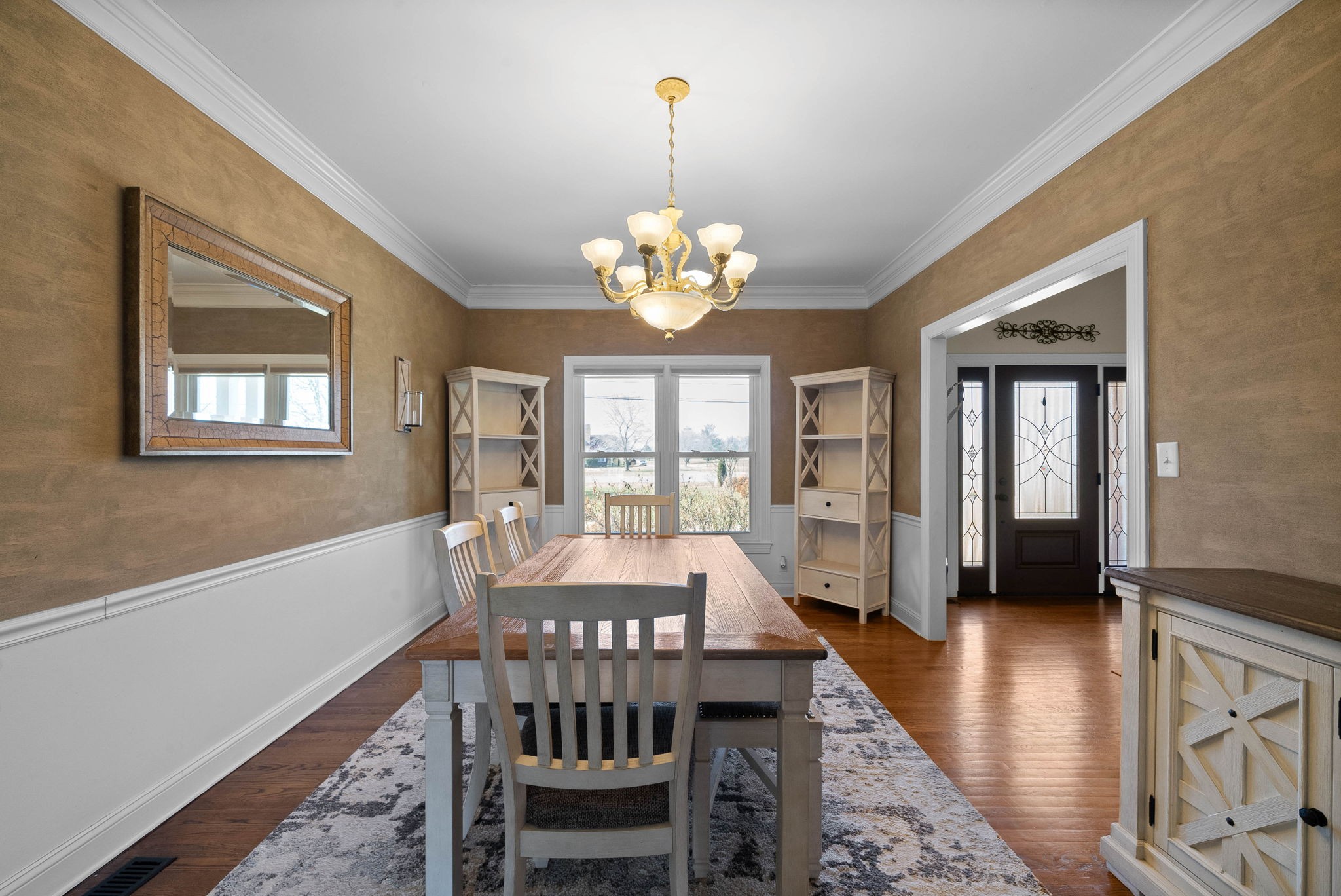 4787 Sango Road Clarksville, TN 37043 - Photo 9 of 55 a view of a dining room with furniture wooden floor and chandelier