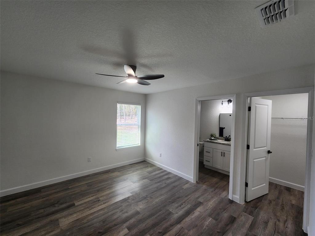 820 Redwood Road Dunnellon, FL 34431 - Photo 11 of 28 a view of a livingroom with wooden floor