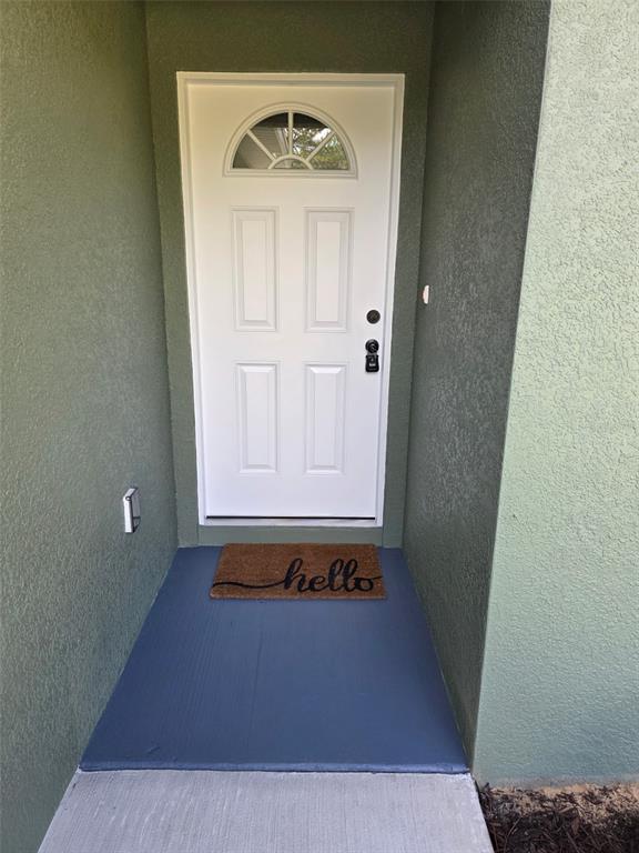 820 Redwood Road Dunnellon, FL 34431 - Photo 4 of 28 view of wooden door