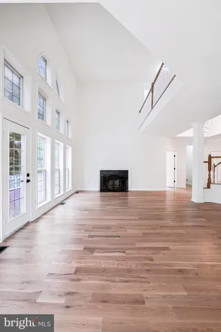 a view of a livingroom with wooden floor