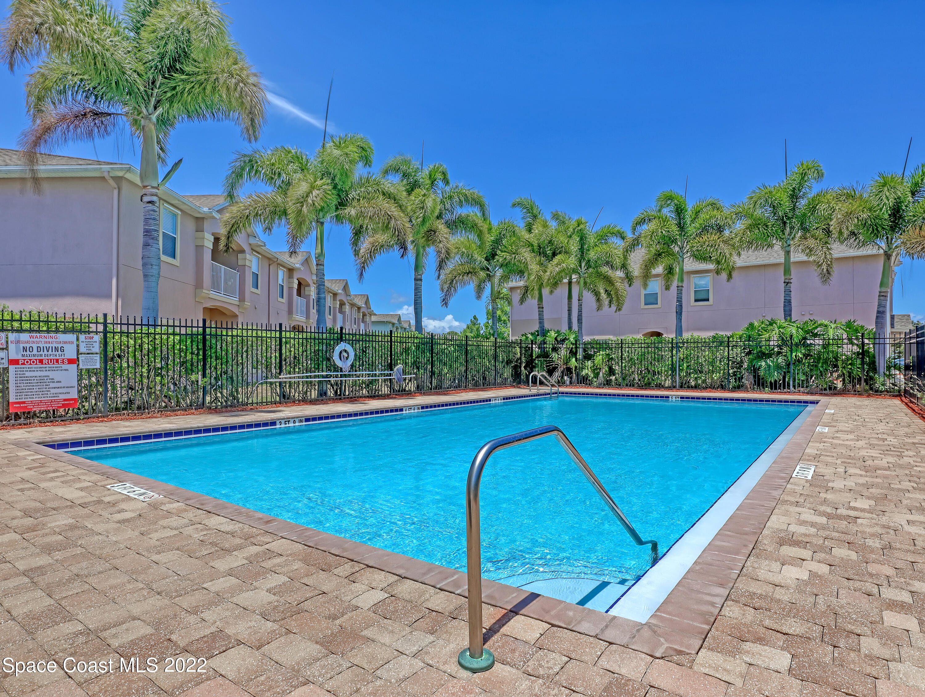 4066 Meander Place, Unit 203 Rockledge, FL 32955 - Photo 18 of 21 a view of swimming pool with a patio