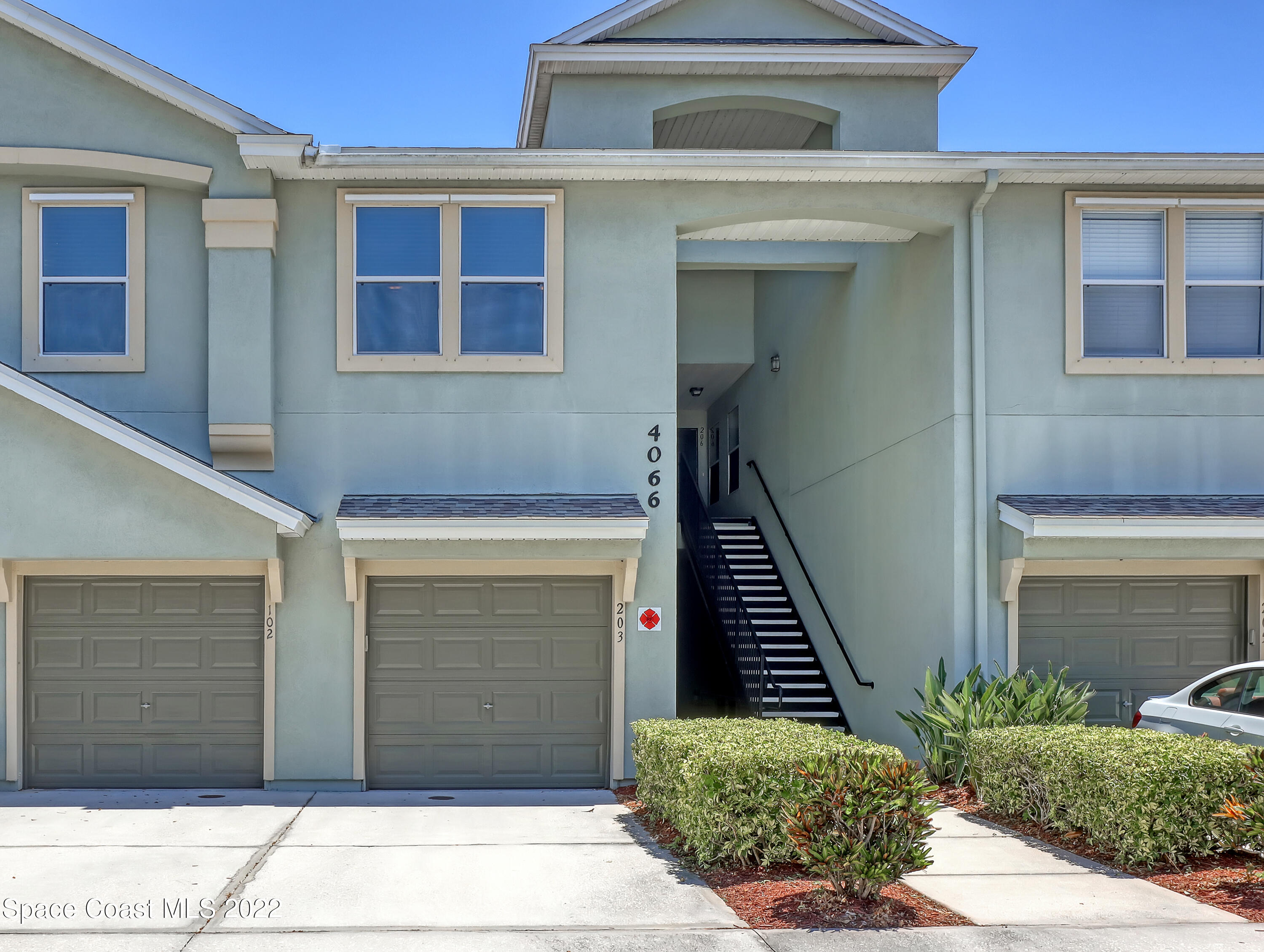 4066 Meander Place, Unit 203 Rockledge, FL 32955 - Photo 2 of 21 a front view of a house