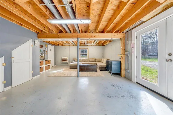 a view of a livingroom with furniture and windows