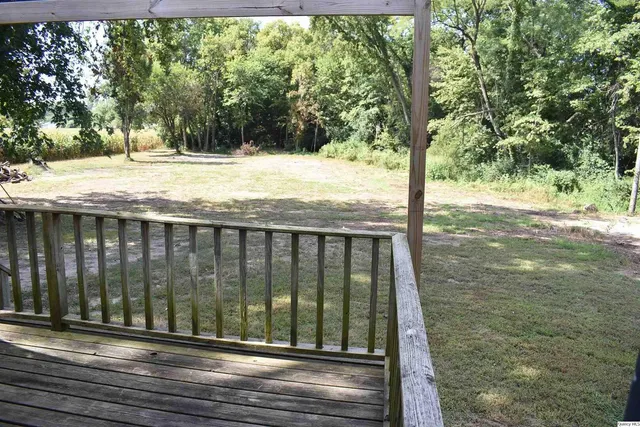 a view of backyard from deck
