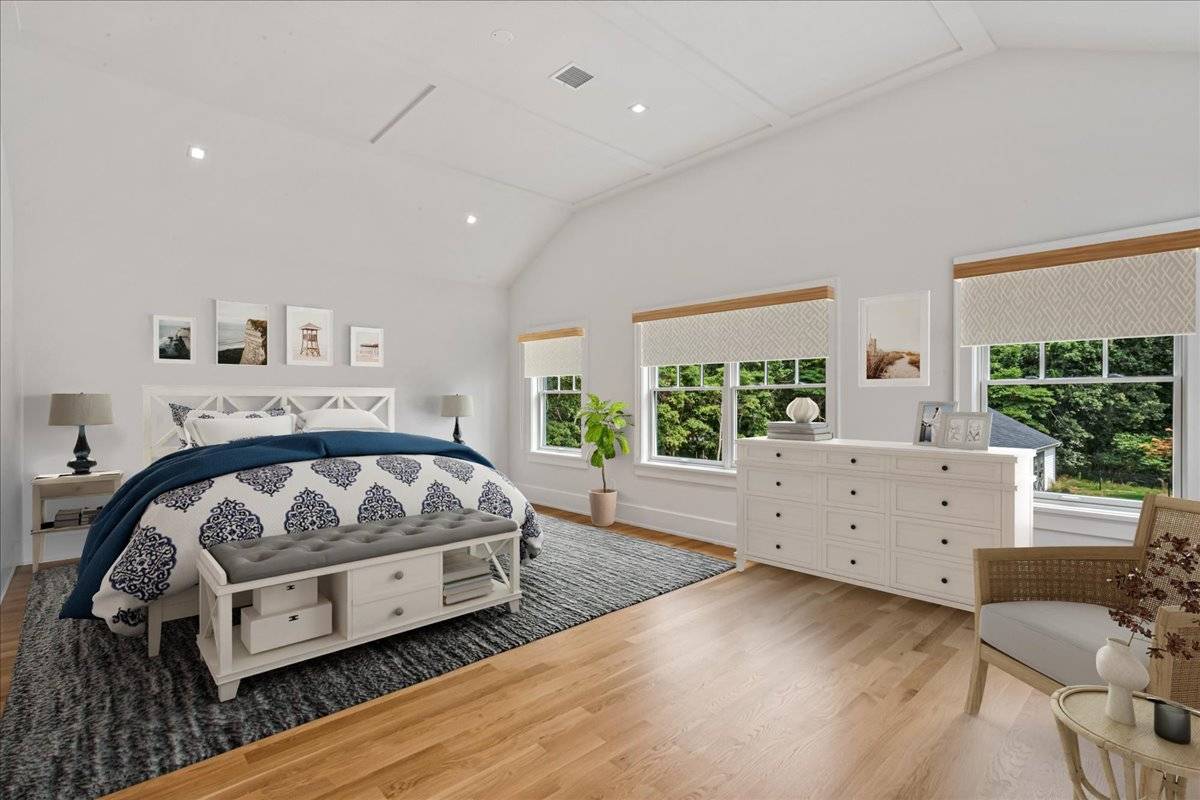 36 Jagger Lane Westhampton, NY 11977 - Photo 21 of 41 a bed room with a bed and a window