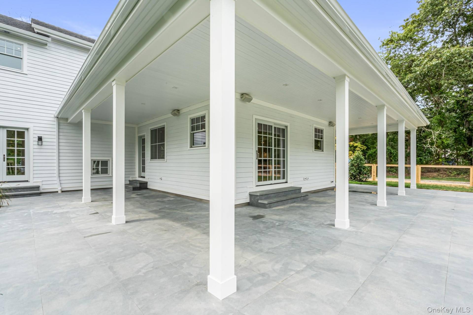 36 Jagger Lane Westhampton, NY 11977 - Photo 36 of 41 front view of a house with a view of outdoor space