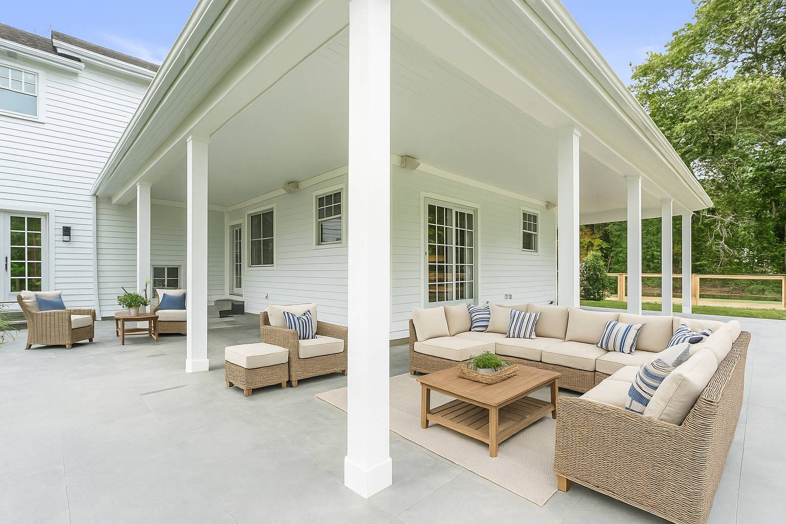 36 Jagger Lane Westhampton, NY 11977 - Photo 37 of 41 a balcony with furniture and large windows