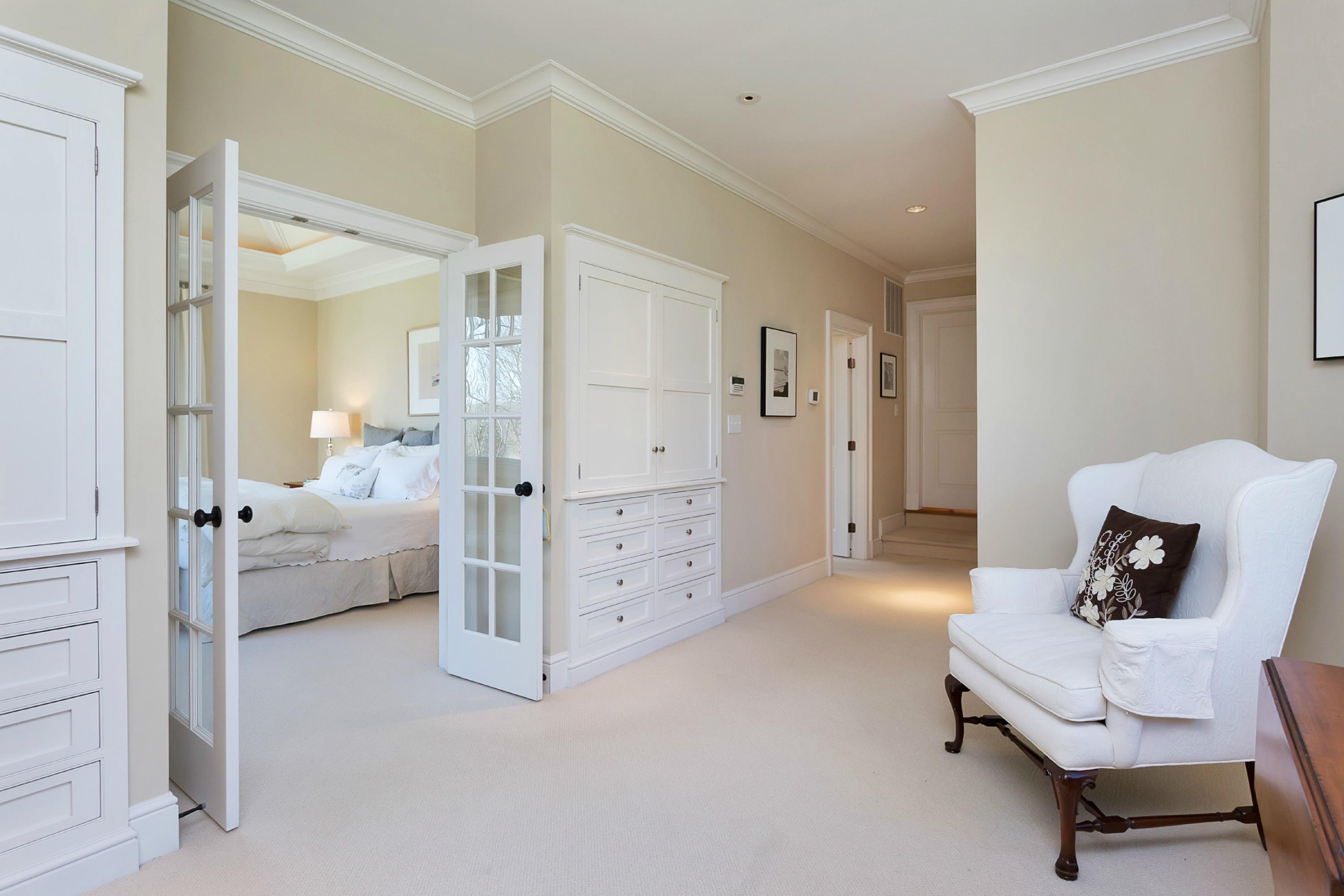 11 Juniper Road Darien, CT 06820 - Photo 12 of 25 a bedroom with furniture and white walls