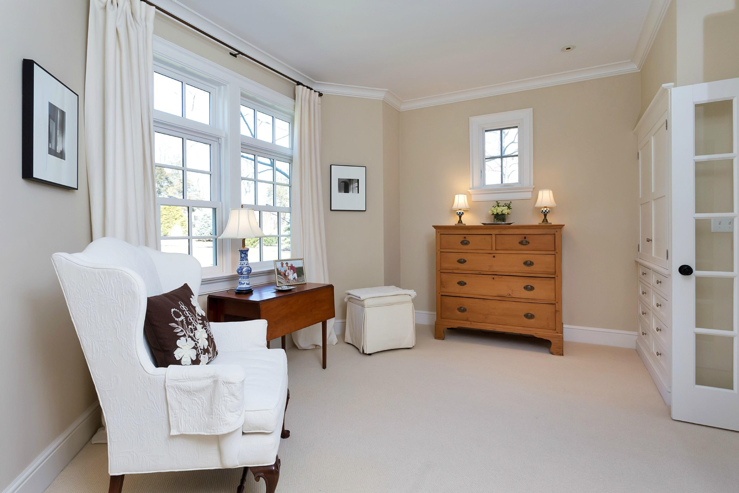 11 Juniper Road Darien, CT 06820 - Photo 13 of 25 a living room with furniture and two windows