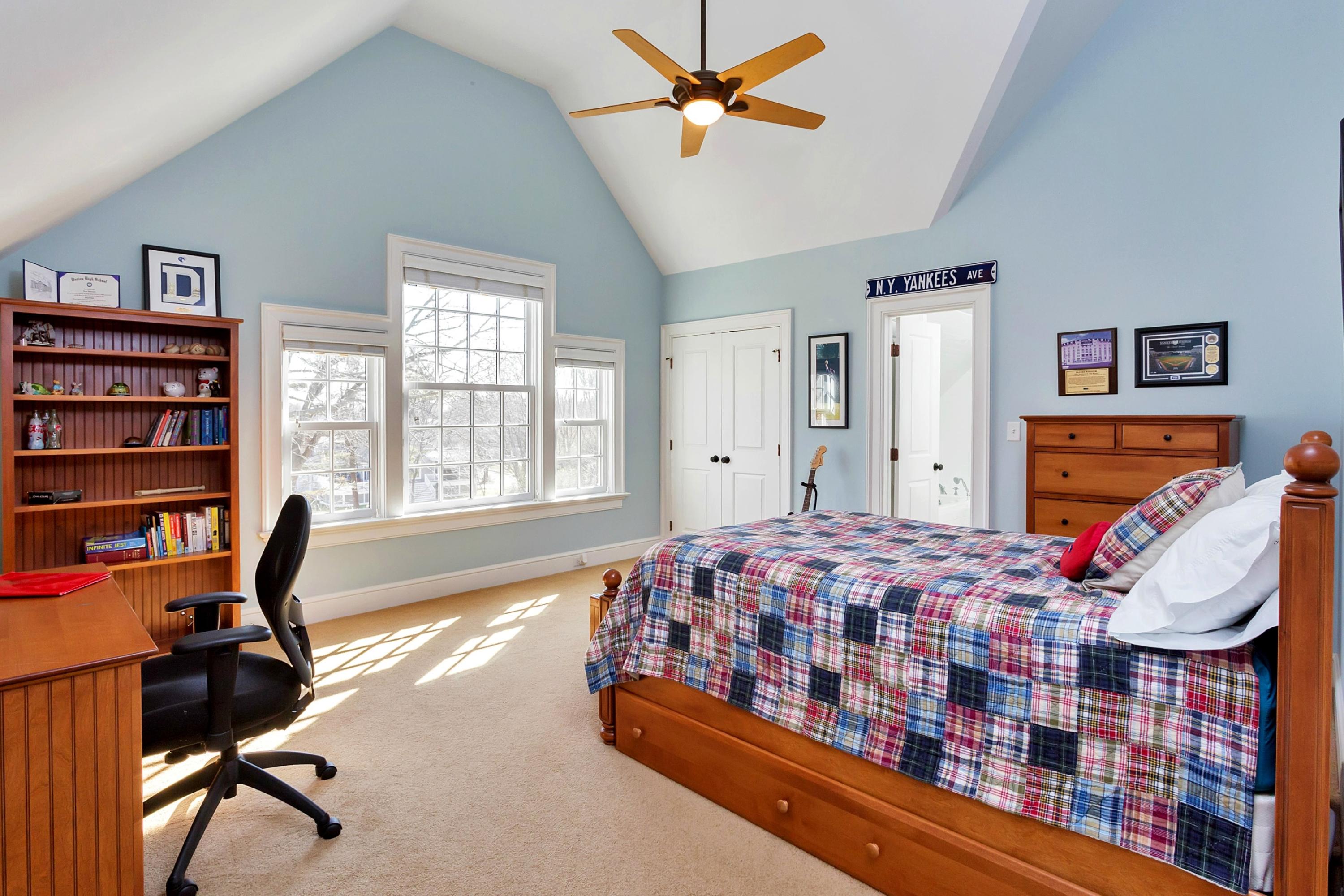 11 Juniper Road Darien, CT 06820 - Photo 19 of 25 a bedroom with furniture and a window