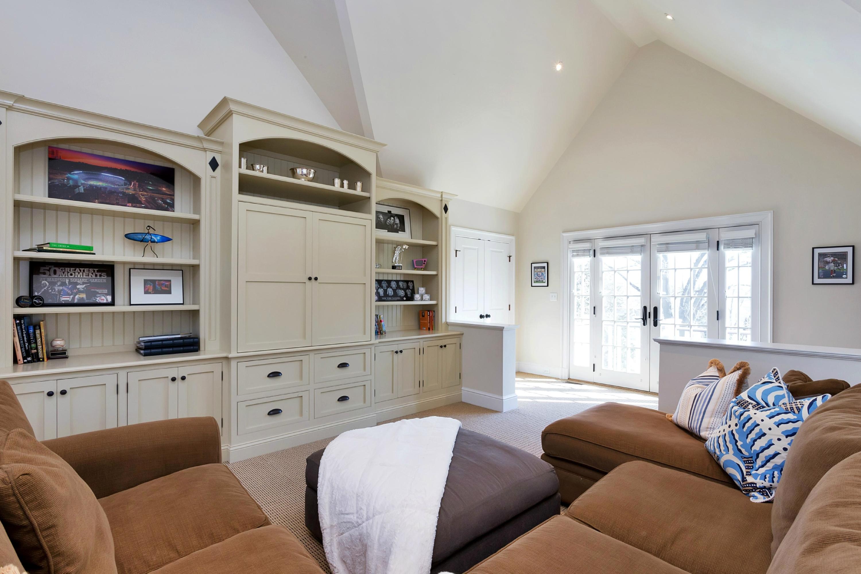 11 Juniper Road Darien, CT 06820 - Photo 22 of 25 a living room with furniture and window