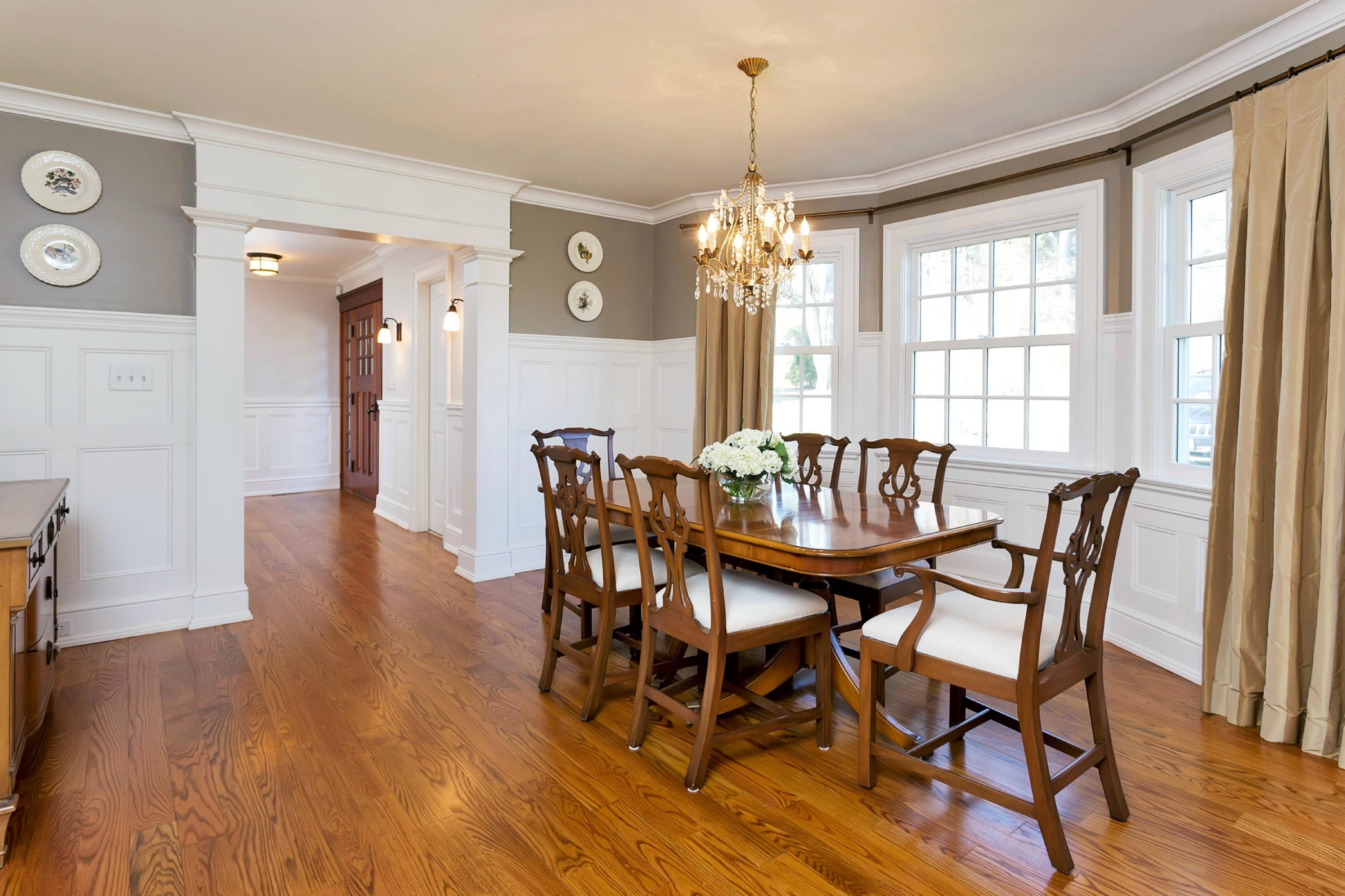 11 Juniper Road Darien, CT 06820 - Photo 7 of 25 a view of a dining room with furniture window and wooden floor