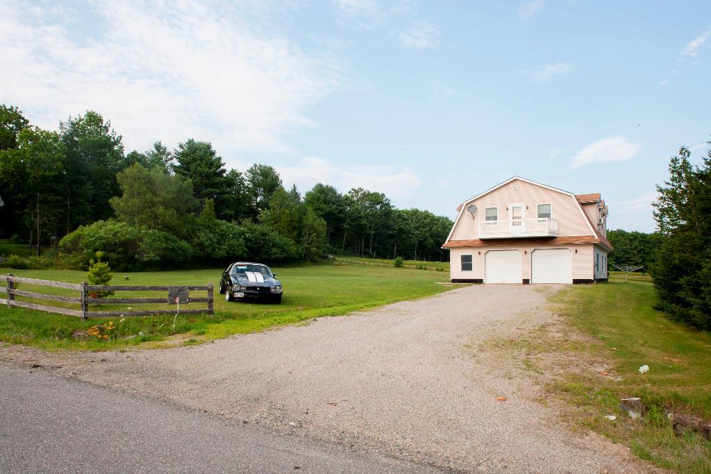 1223 Great Pond Road Aurora, ME 04408 - Photo 3 of 28 Set back off the road
