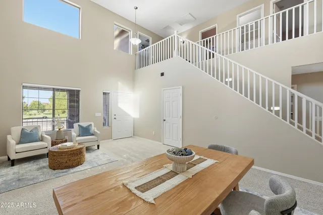 a bedroom with furniture and a table