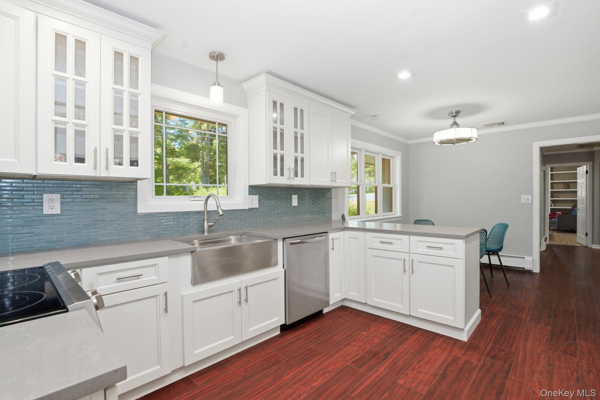 35 Deans Bridge Road Somers, NY 10589 - Photo 6 of 49 New windows, including an awning window that cranks open to the breeze, pour natural light over your fully renovated kitchen.