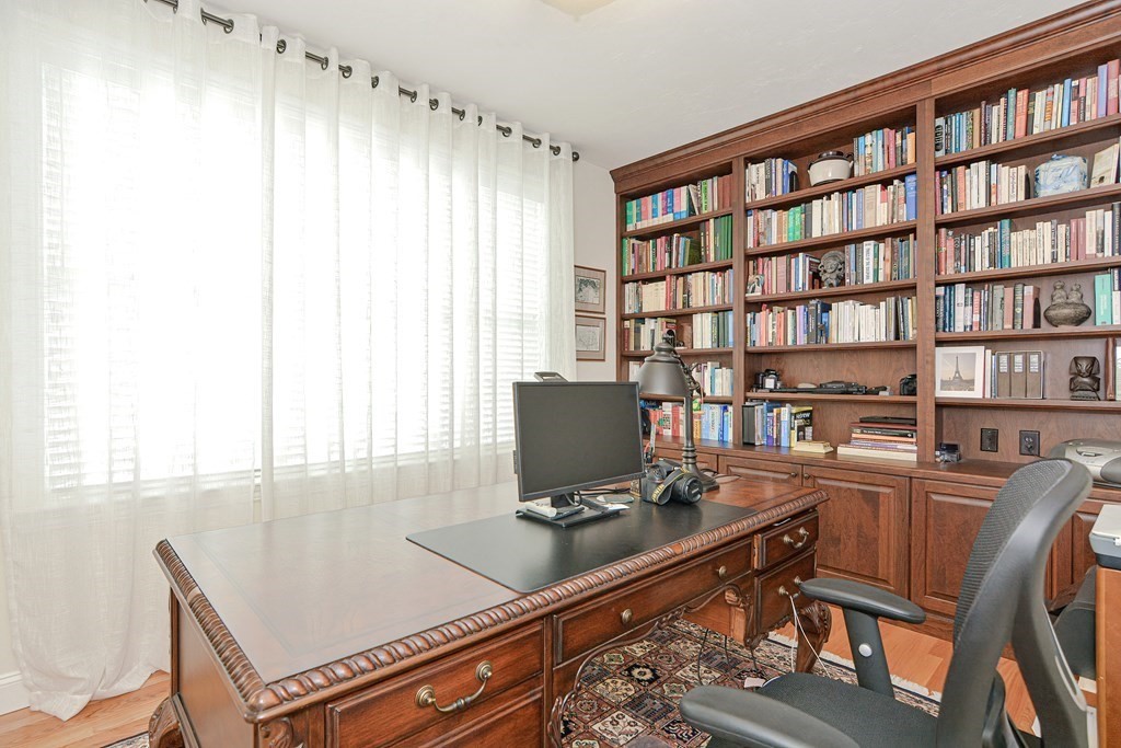 1 Ridgewood Street Ashland, MA 01721 - Photo 4 of 30 a view of a workspace with furniture