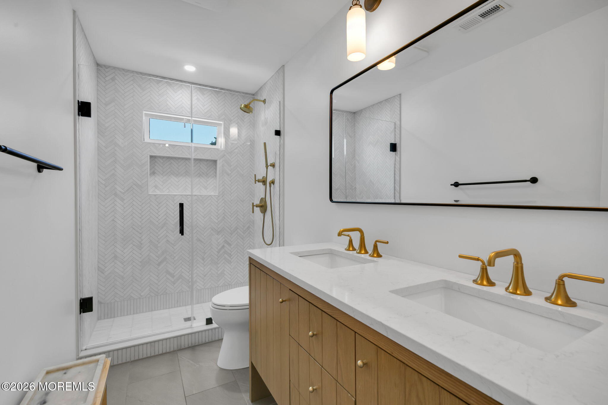 53 Field Avenue Red Bank, NJ 07701 - Photo 13 of 39 a bathroom with a sink a toilet and shower