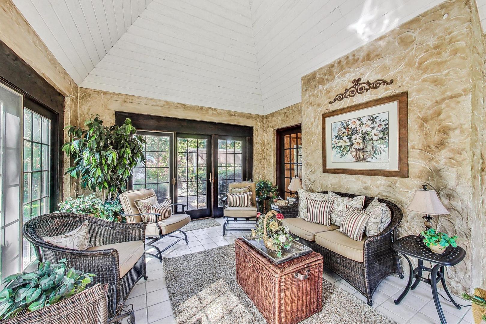 4915 Terra Cotta Road Crystal Lake, IL 60012 - Photo 30 of 93 a living room with furniture potted plant and a large window