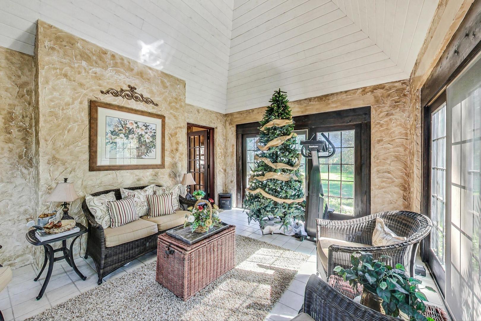 4915 Terra Cotta Road Crystal Lake, IL 60012 - Photo 31 of 93 a living room with furniture and a large window