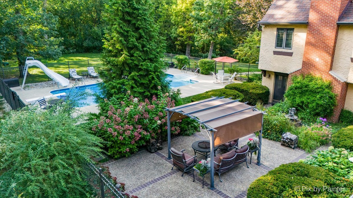 4915 Terra Cotta Road Crystal Lake, IL 60012 - Photo 53 of 93 a backyard of a house with table and chairs