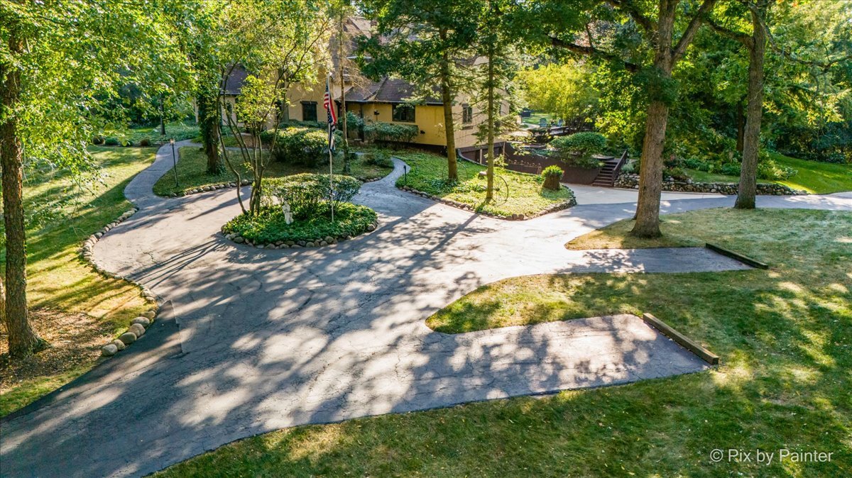 4915 Terra Cotta Road Crystal Lake, IL 60012 - Photo 8 of 93 a view of a backyard with swimming pool