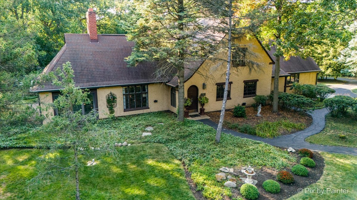 4915 Terra Cotta Road Crystal Lake, IL 60012 - Photo 89 of 93 a front view of a house with a yard and green space