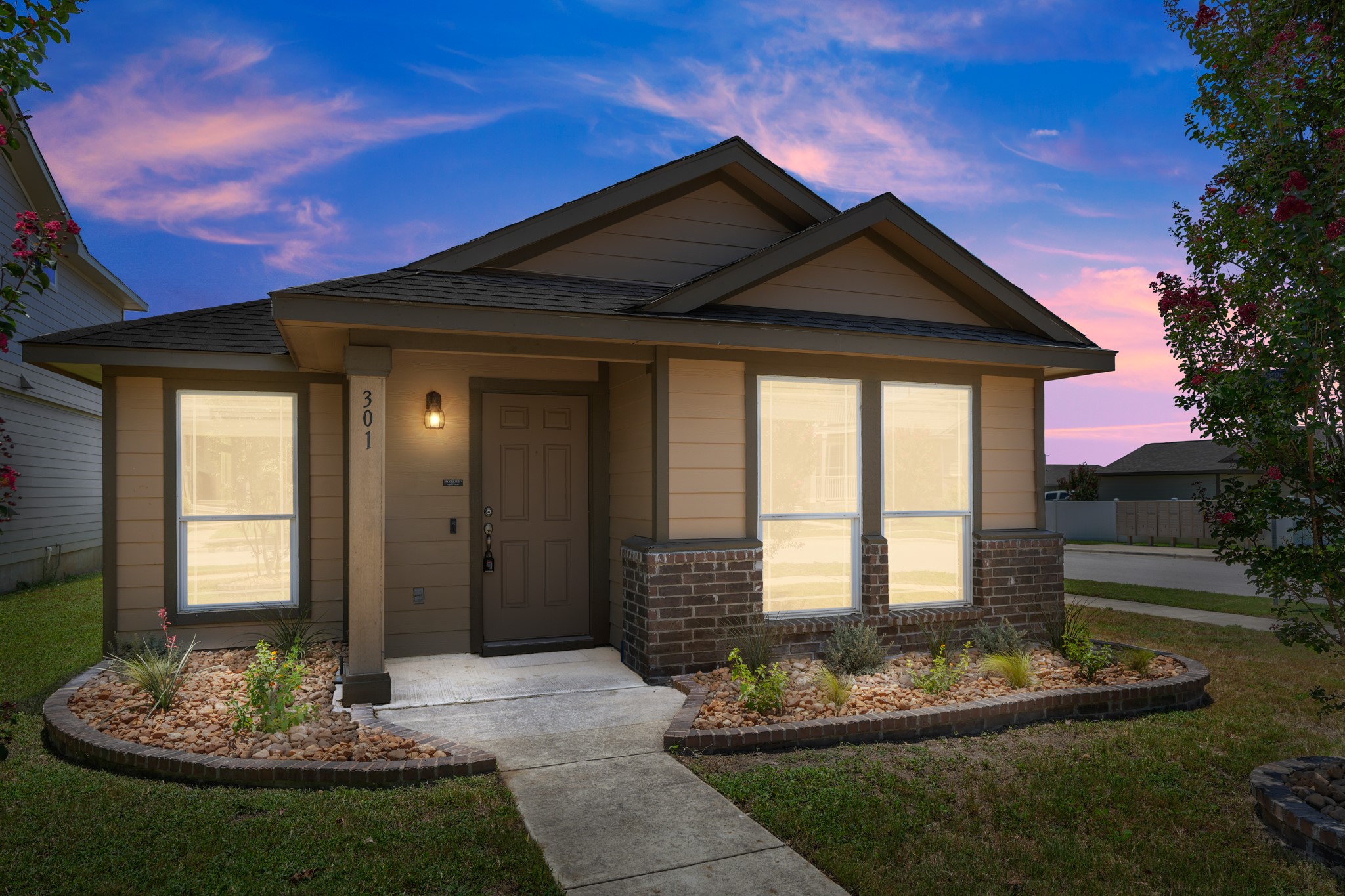 301 Cane River Road Pflugerville, TX 78660 - Photo 1 of 22 A charming single-story residence with neat landscaping and a welcoming entry.